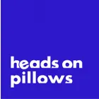 HEADS ON PILLOWS